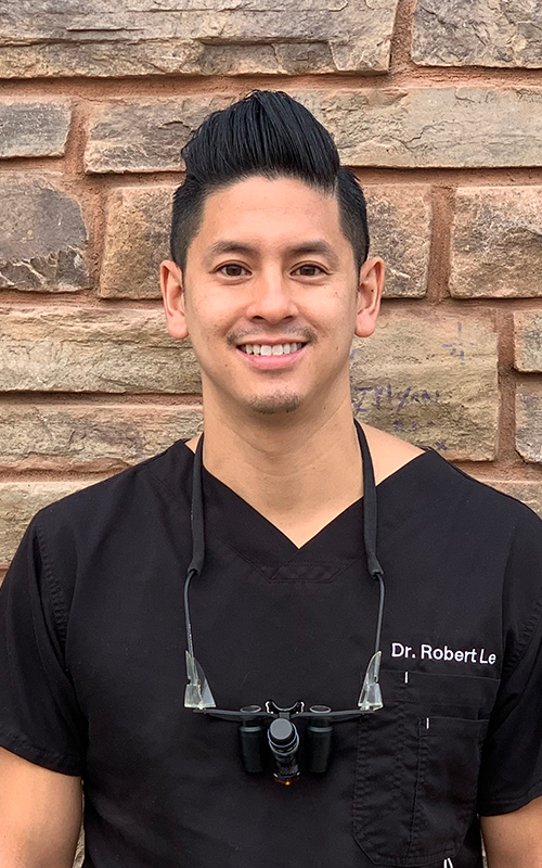 A staff photo of Dr. Le, a dentist at New Vision Dentistry